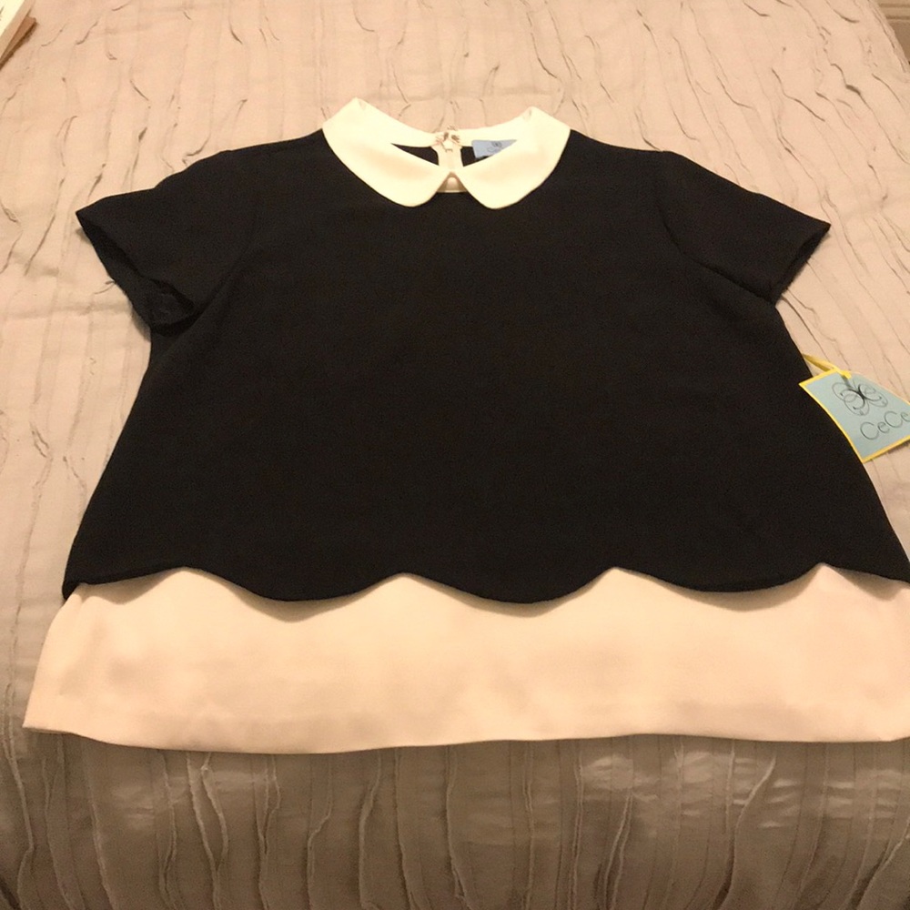 CeCe black and white shirt sleeve blouse